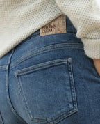 Jean de grossesse mom fit carrie mid blue used, cache cœur